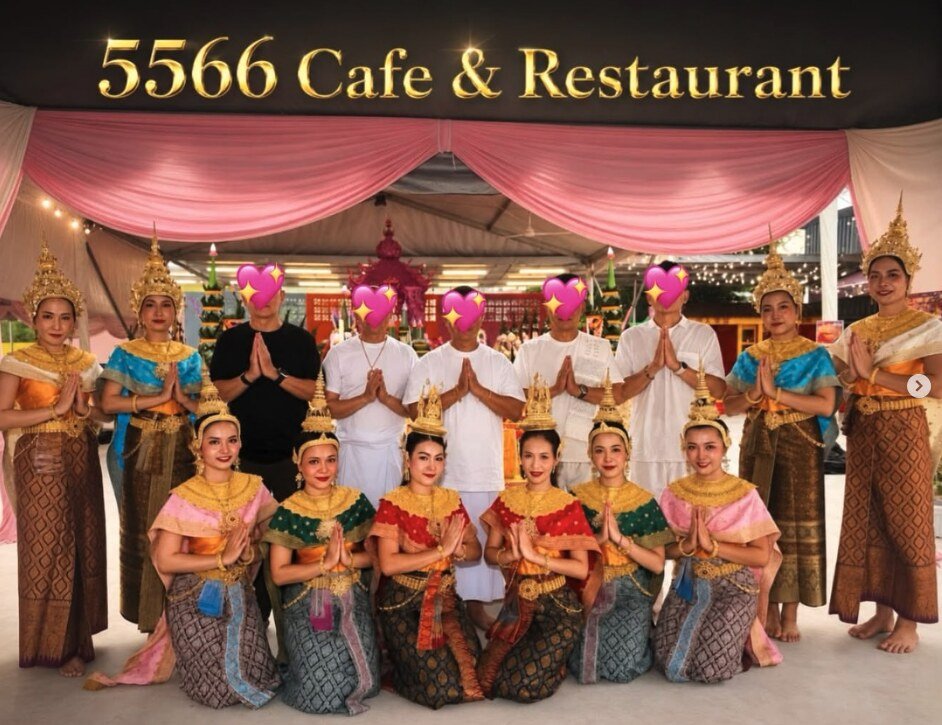 MY.Thaidance dancers in colourful traditional Thai costumes and gold headdresses with guests at a celebration at 5566 Cafe & Restaurant